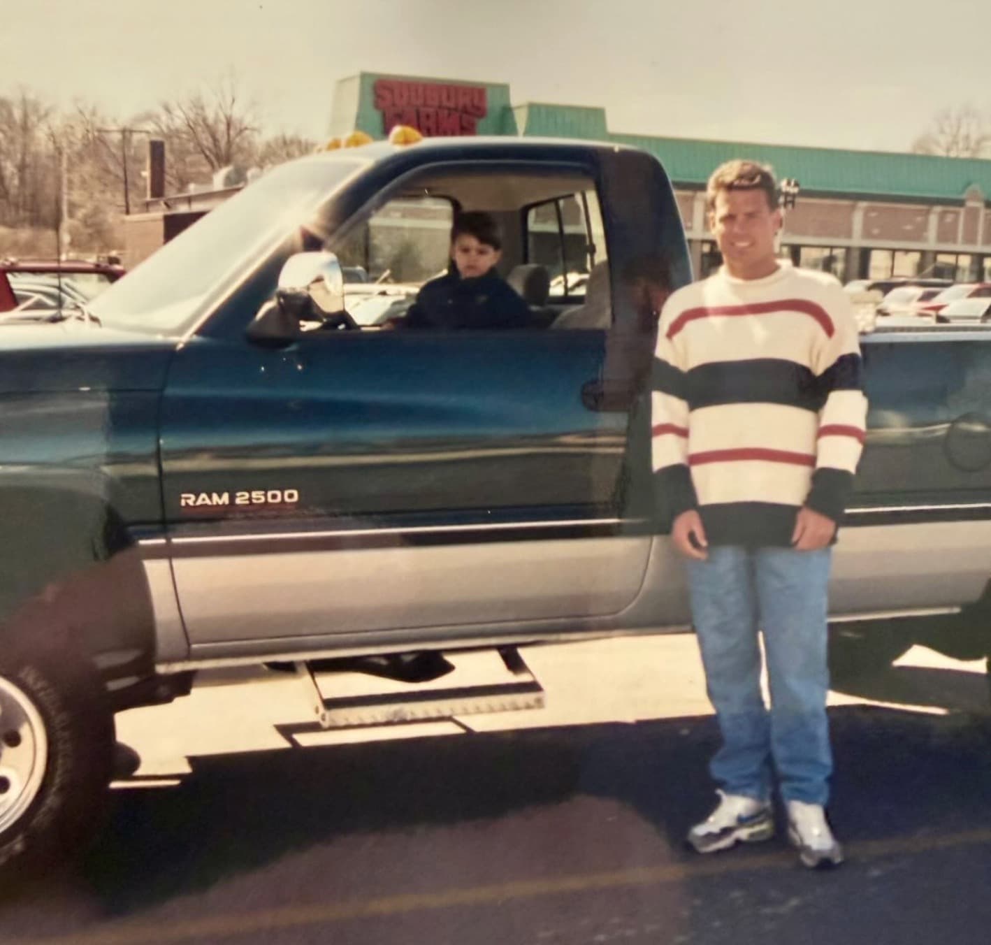 Shawn Clancy as a child with his father at a D. Clancy & Sons job site in 1996.